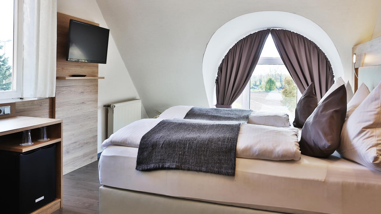 Hotel Bauschheimer Hof Рюссельхайм Экстерьер фото